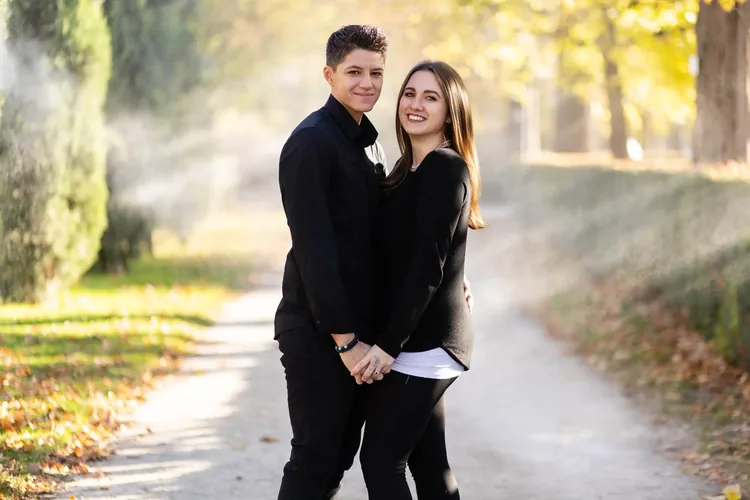Newly engaged queer couple in Vienna's Volksgarten